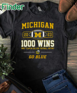 black T shirt Michigan Wolverines 2023 1000 Wins First Team In College Football History Go Blue T shirt