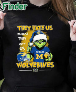 black hoodie They Hate Us Because Ain't Us Michigan Wolverines Go Blue The Grinch Christmas Shirt