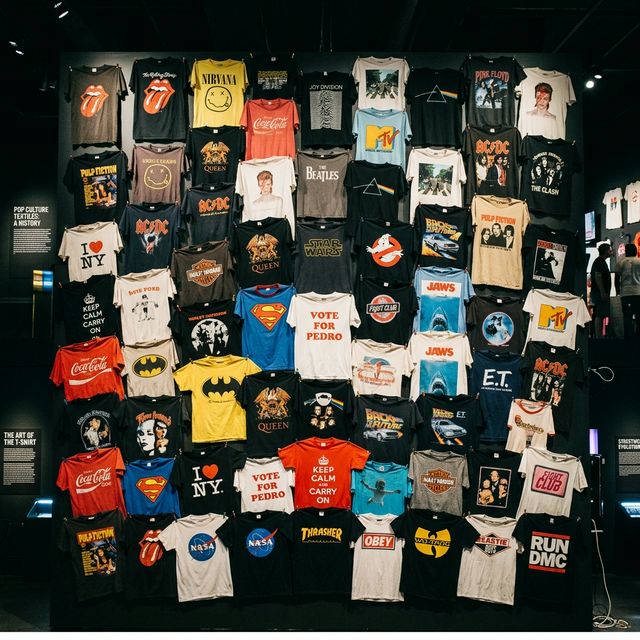 Collage of iconic pop culture t-shirts displayed in museum style