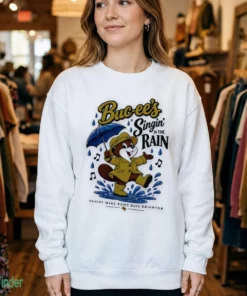 buc ee s singin in the rain snacks make rainy days brighter sweatshirt white female