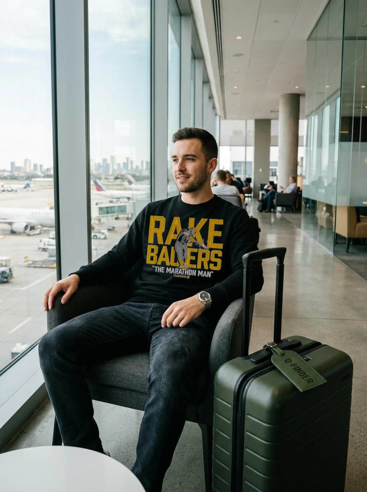 jake bauers rake bauers marathon man black sweatshirt airport lounge Jake Bauers Rake Bauers Marathon Man Shirt - Close-up Graphic Detail Mockup