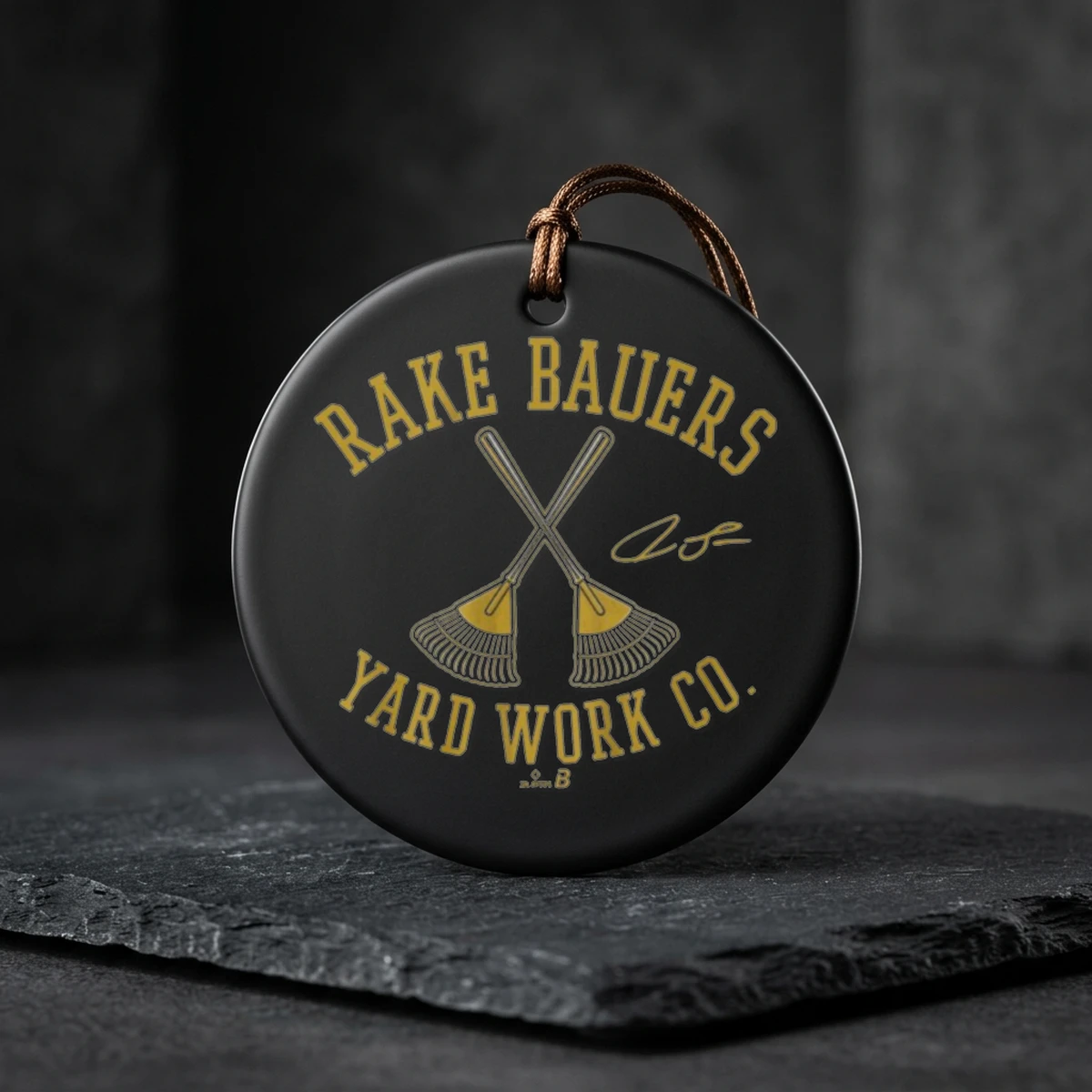 rake bauers yard work co ceramic ornament Rake Bauers Yard Work Co Shirt Ornament - Close-up Graphic Detail Mockup