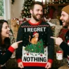 smug cat toppling christmas tree funny pet owner gift christmas sweater