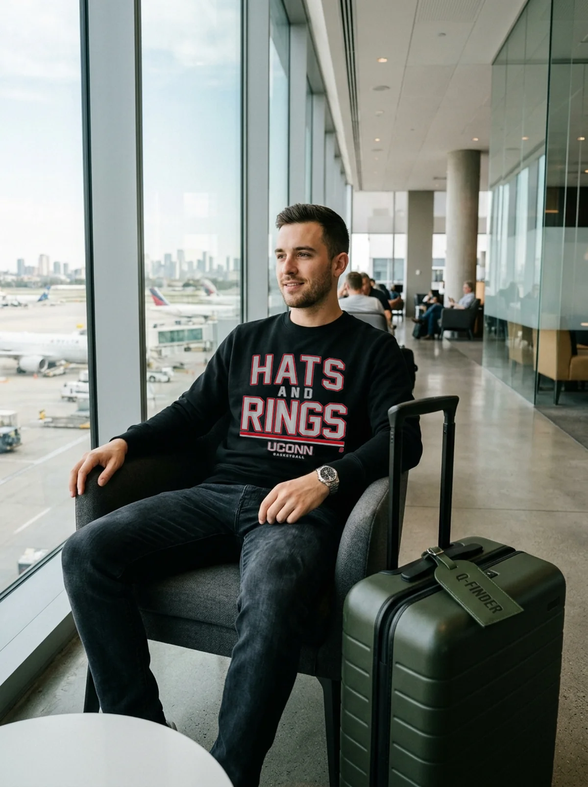 uconn basketball hats and rings black sweatshirt airport lounge uconn basketball hats and rings black sweatshirt airport lounge